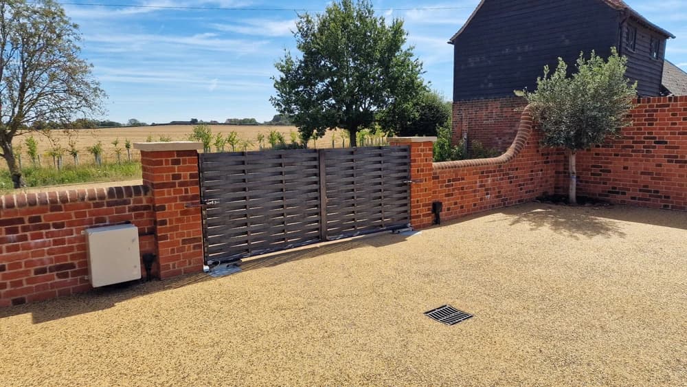 Rear view of a steel basket-weave sliding gate
